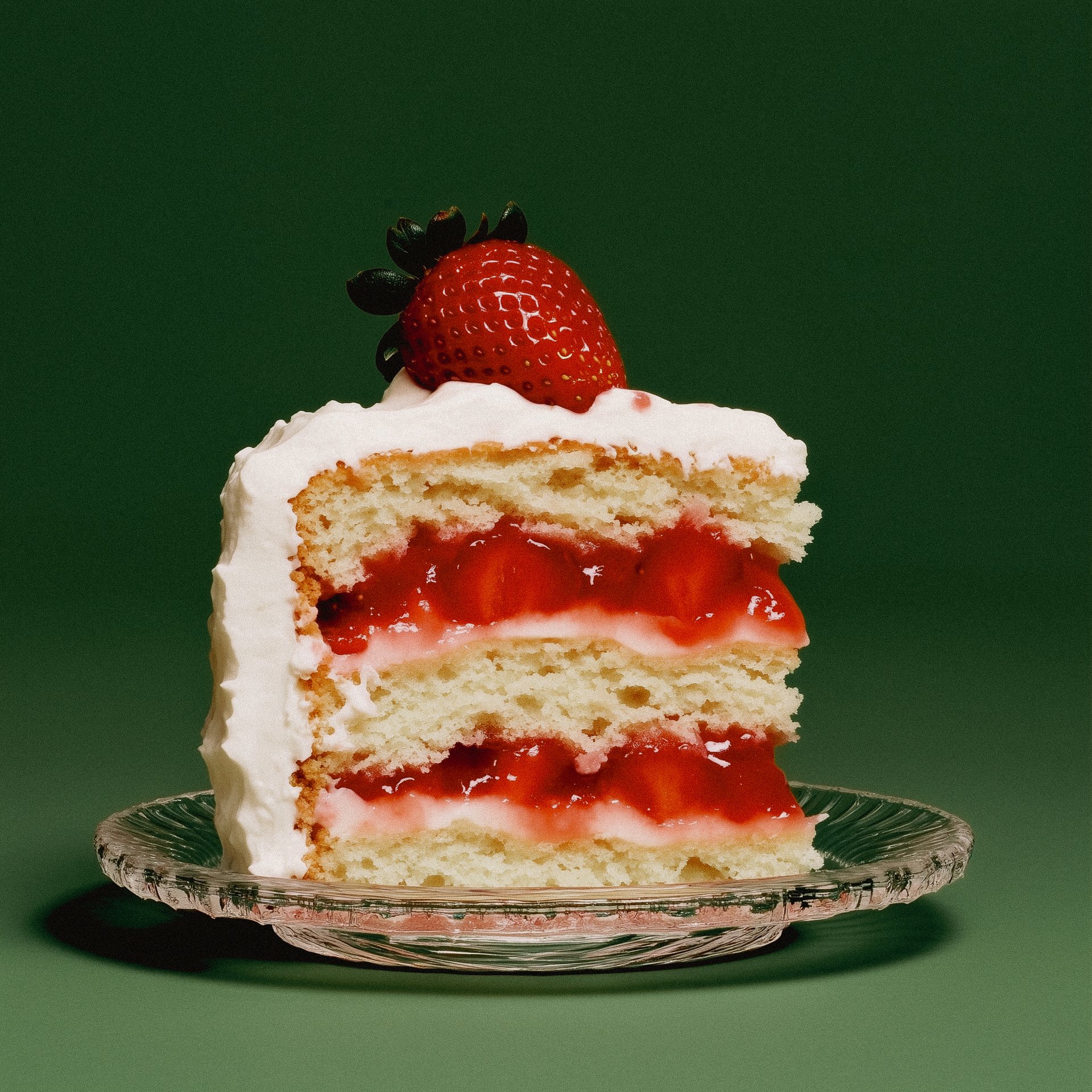 Strawberry cake on green