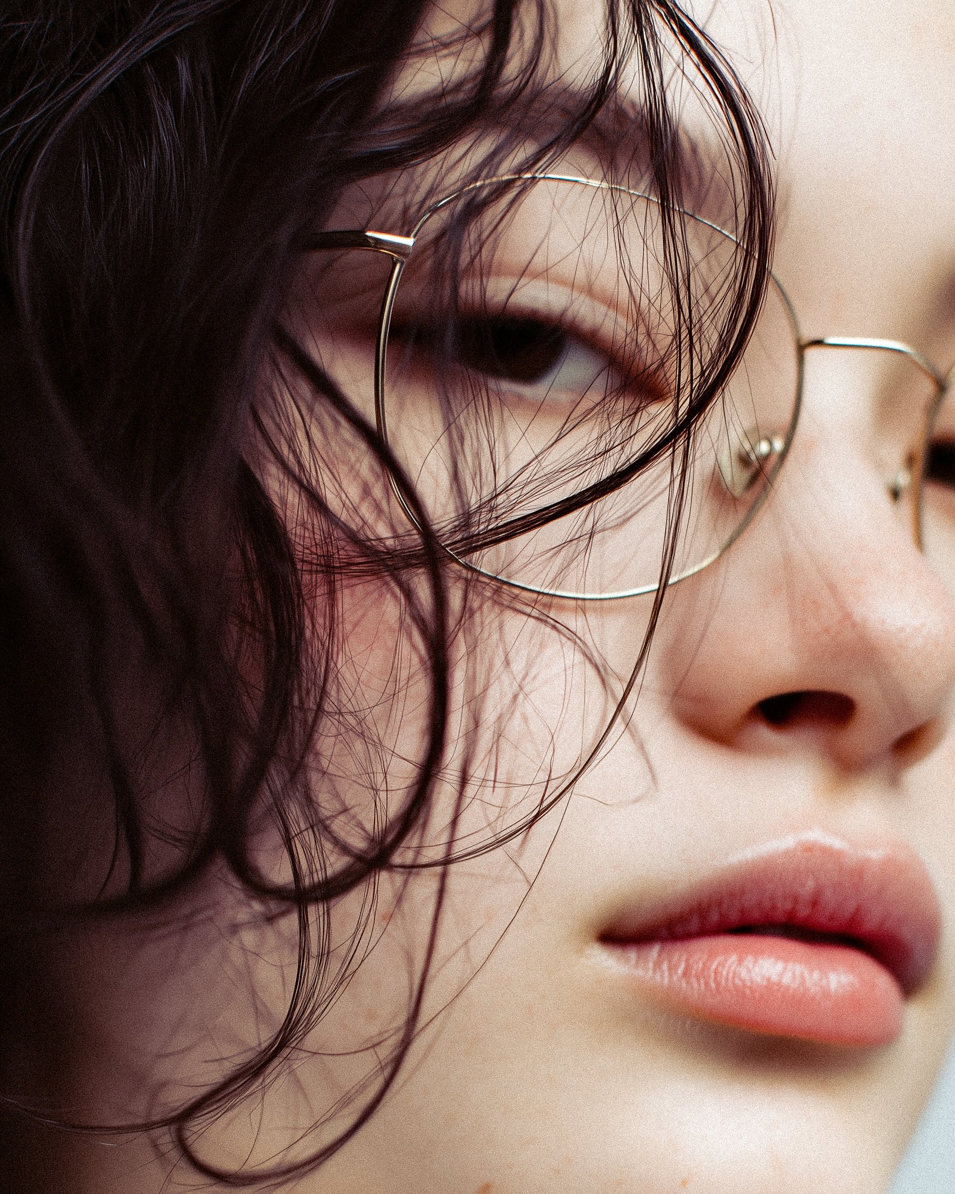 Freckled Woman With Glasses Closeup