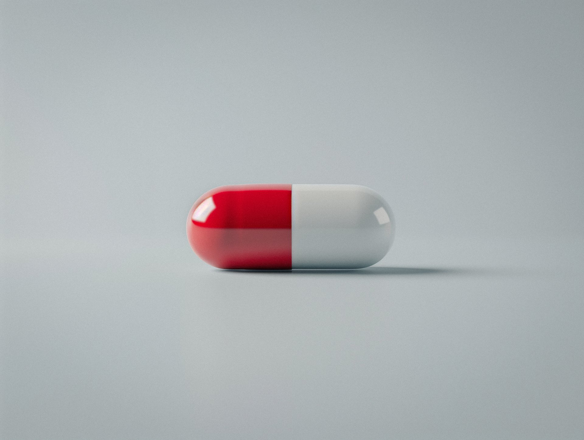 red and white capsule drug