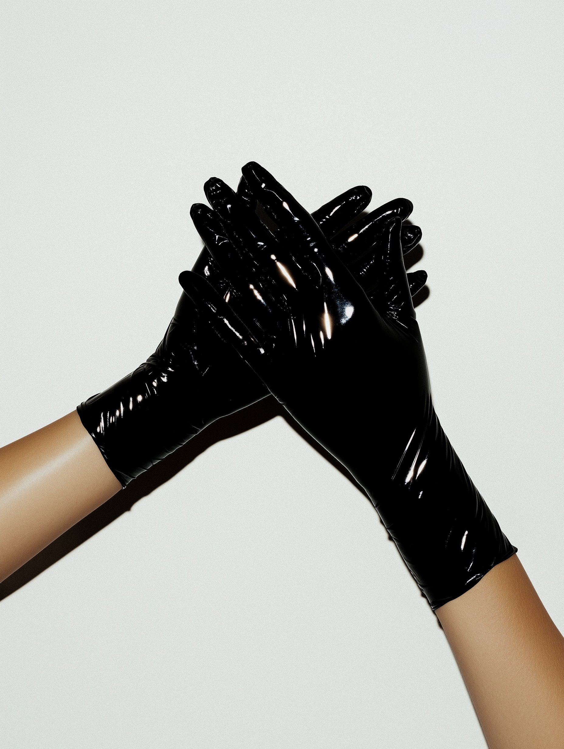 Hands in Black Gloves