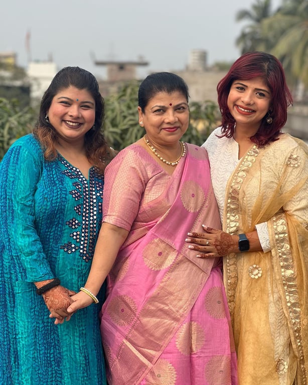 Arjya with her mother Jharana and younger sister Ananya