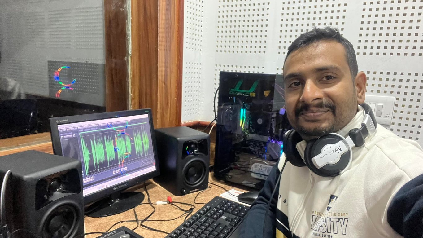 Subrat Pati working at his radio broadcasting station