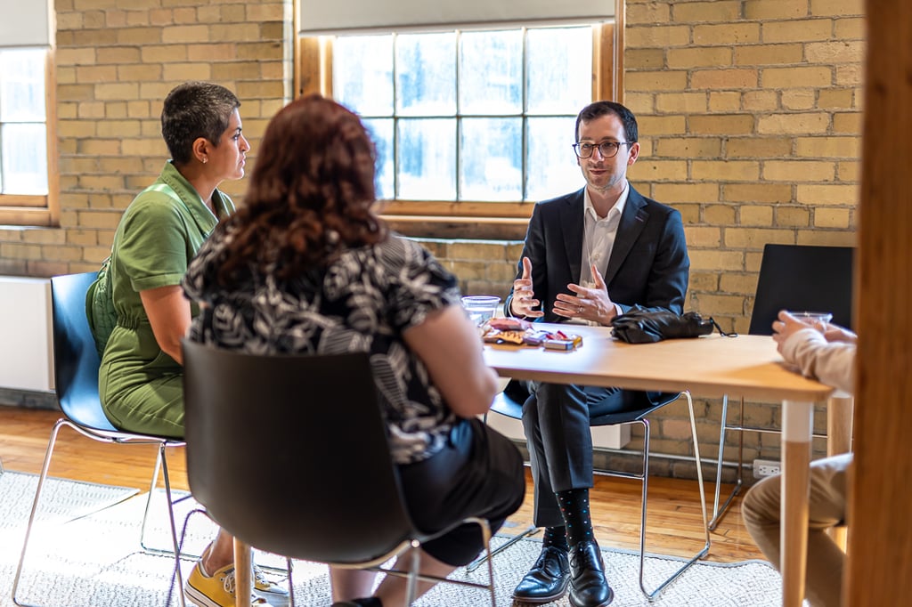 Michael Morreale (The Arts Firm and ArtsBoost) speaks with students at a discussion table during the "Navigating a Career in the Arts, Culture & Media" event. Photo credit: Murphy Owusu