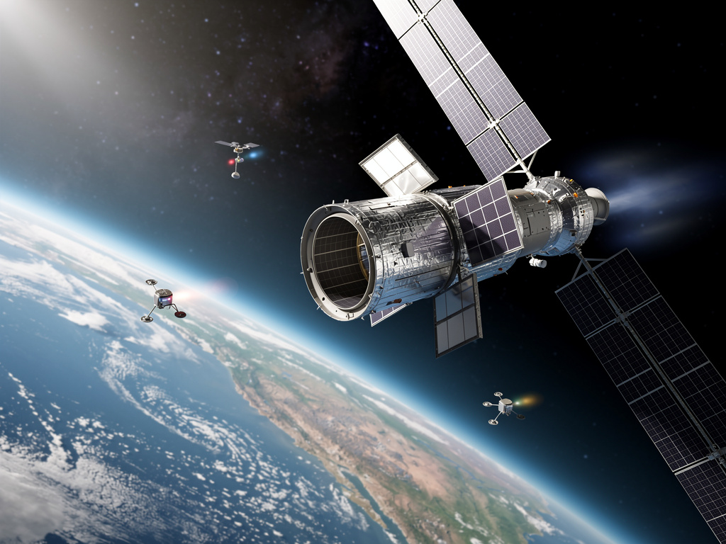 Schéma klesající oběžné dráhy Hubbleova teleskopu v čase