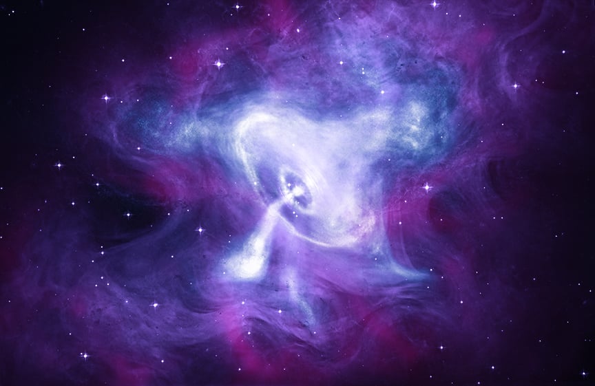 Modrobílé a fialové struktury Krabí mlhoviny kolem centrálního pulsaru na složeném astronomickém snímku.
