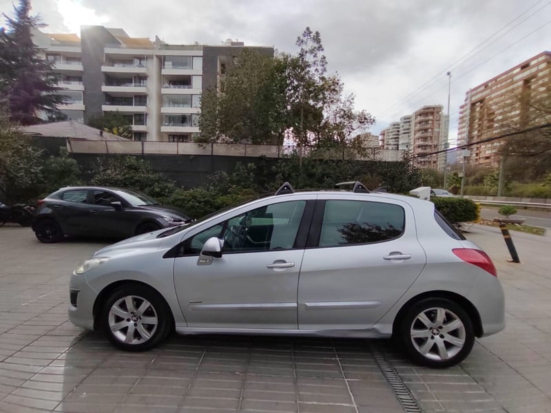 Peugeot 308 1.6 SPORTIUM HDI DIESEL 4X2 MT 5P 2014 - Imagen 4 de 10