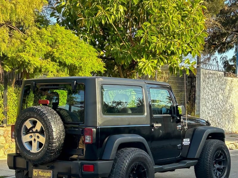 Jeep WRANGLER 3.6L SPORT AT 🇺🇸 2013 - Imagen 9 de 10