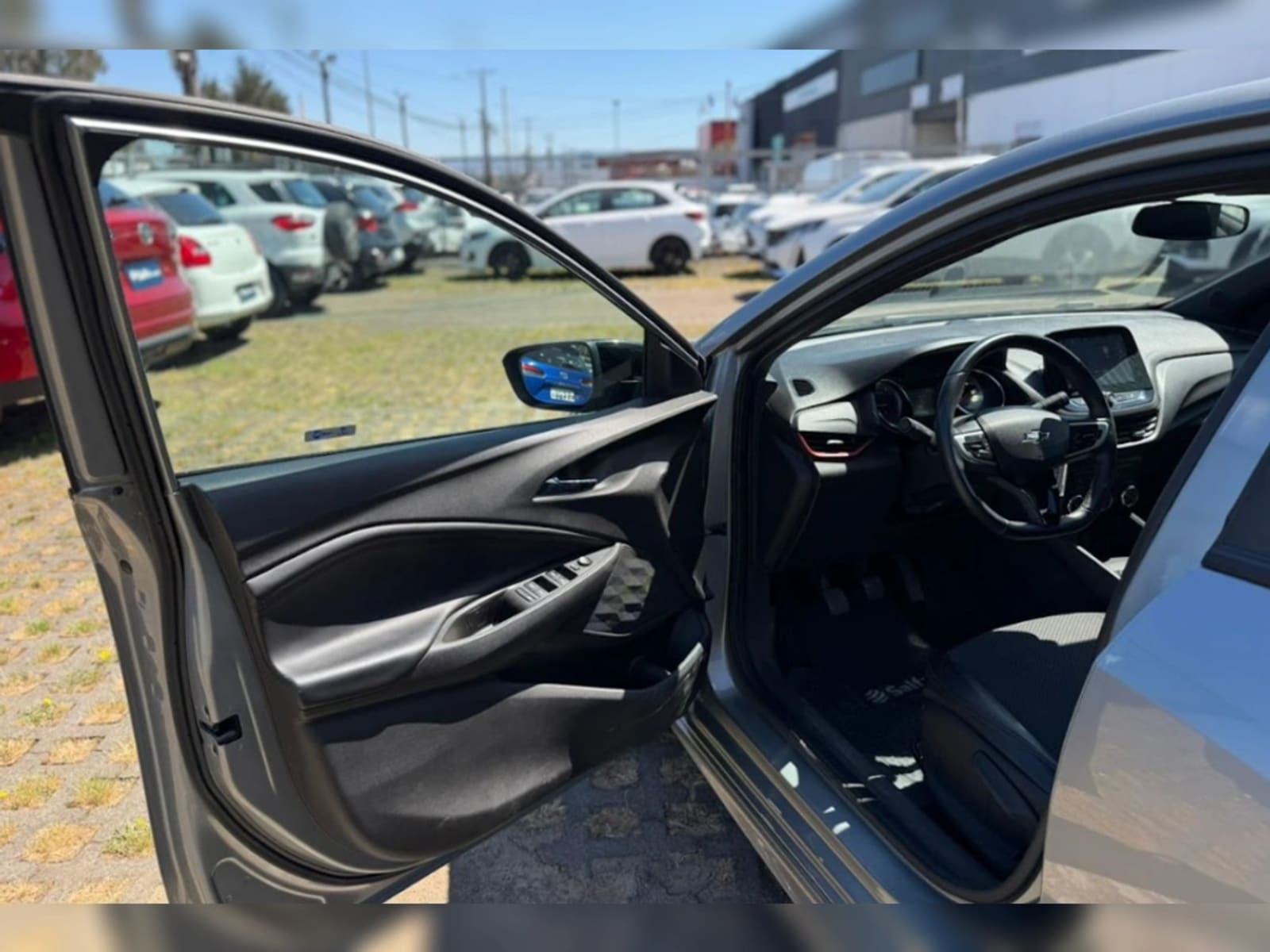 CHEVROLET ONIX 1.0T RS R 4X2 HB MT 5P 2024 - Imagen 9 de 20