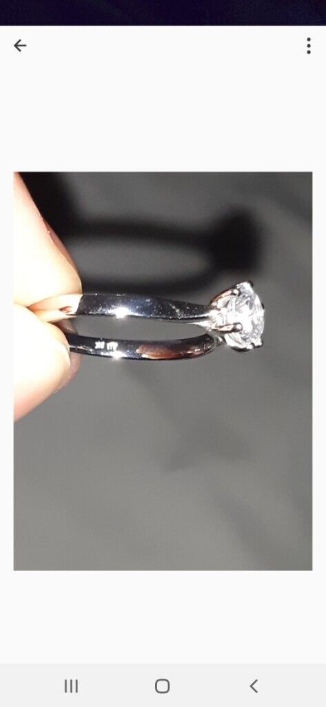 Premier Round Brilliant Trilogy Ring