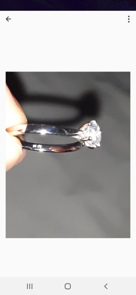 Premier Round Brilliant Trilogy Ring