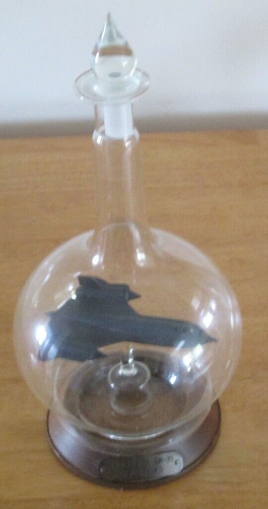 MODEL OF USAF SR 71 BLACKBIRD AIRCRAFT IN GLASS BOTTLE WITH STAND VGC