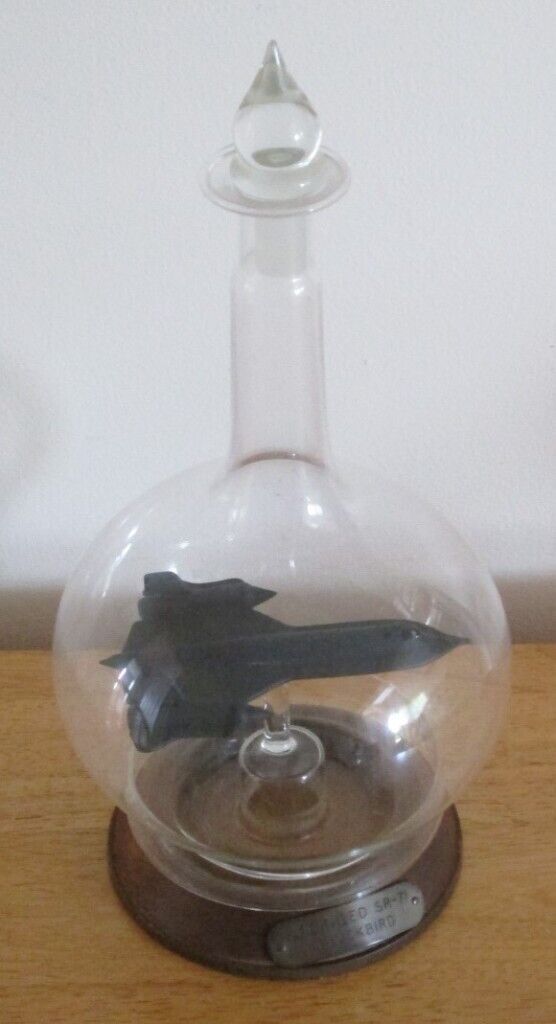 image for MODEL OF USAF SR 71 BLACKBIRD AIRCRAFT IN GLASS BOTTLE WITH STAND VGC