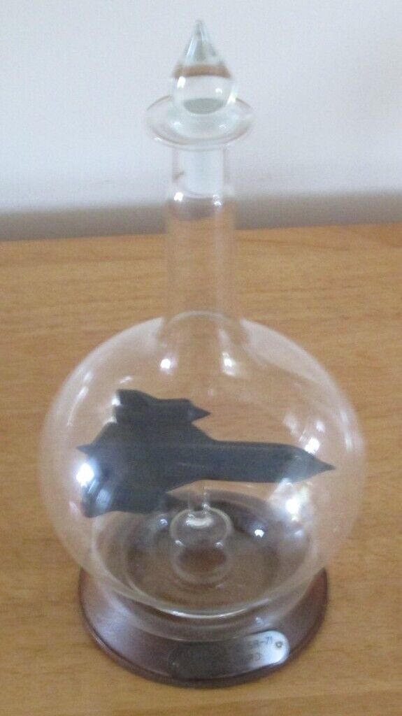 MODEL OF USAF SR 71 BLACKBIRD AIRCRAFT IN GLASS BOTTLE WITH STAND VGC