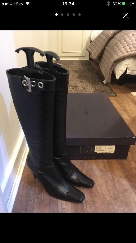 Gorgeous Prada black leather boots. Size 35.