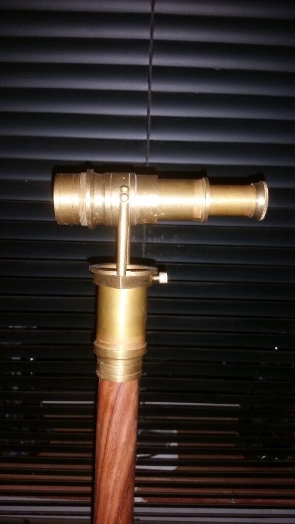 vintage walking stick with inbuilt brass telescope