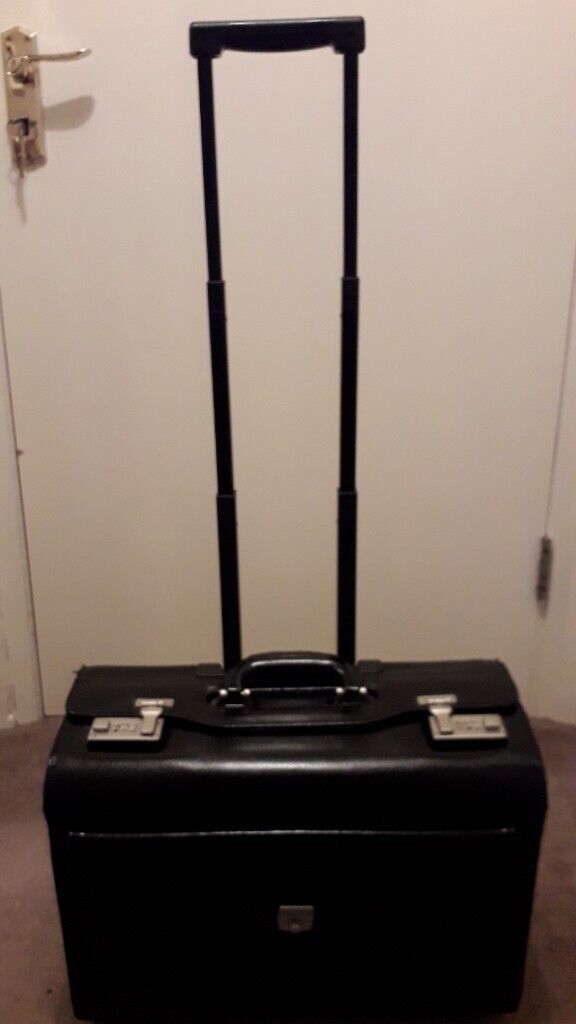 LARGE LEATHER WHEELED FLIGHT CASE WITH LONG HANDLE 