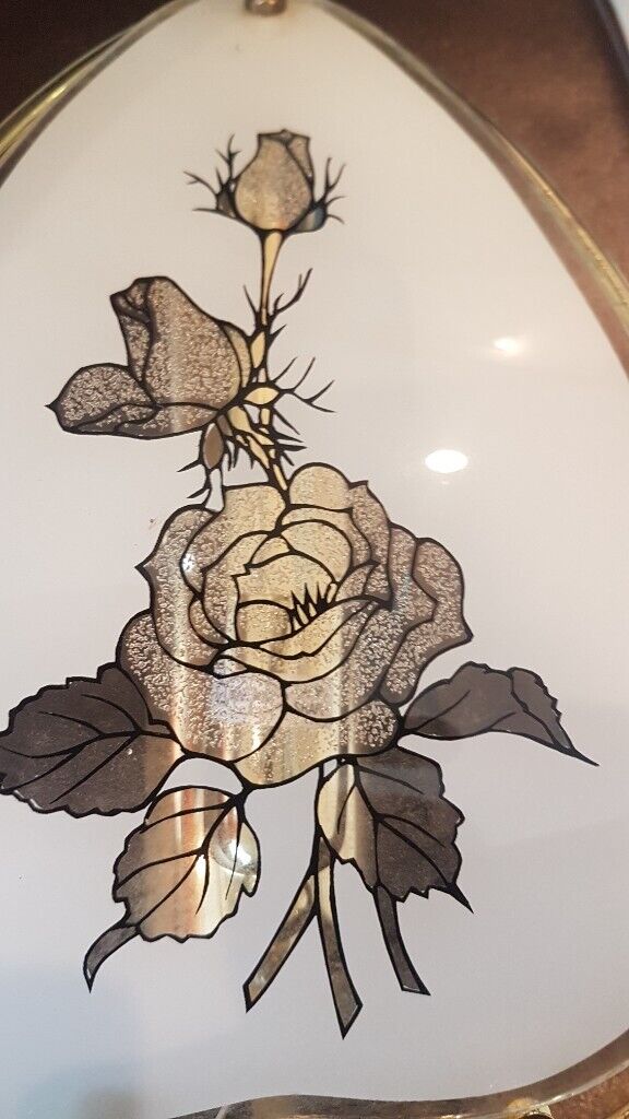 4 matching glass wall light fittings with floral pattern 