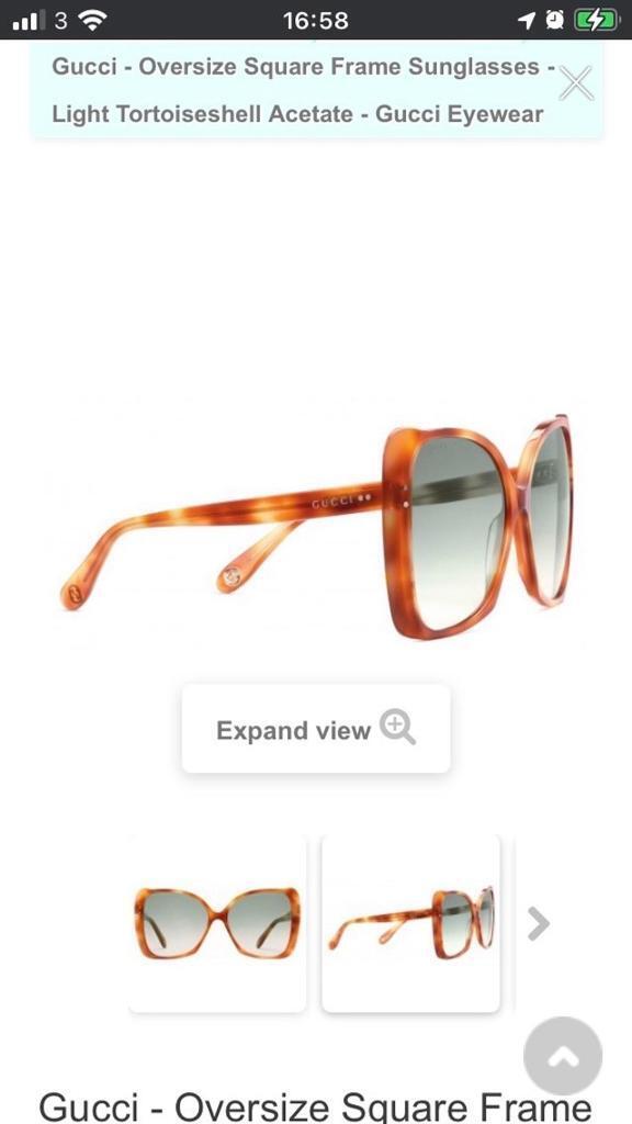 Gucci Light tortoiseshell acetate frame.