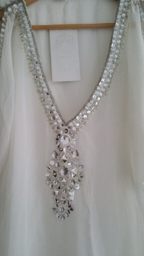 White top with Crystals- Size 10-12 (New-Not worn)