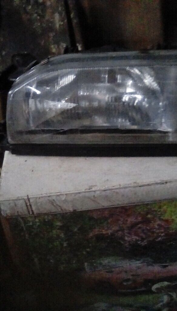 Mazda 323 headlight unit