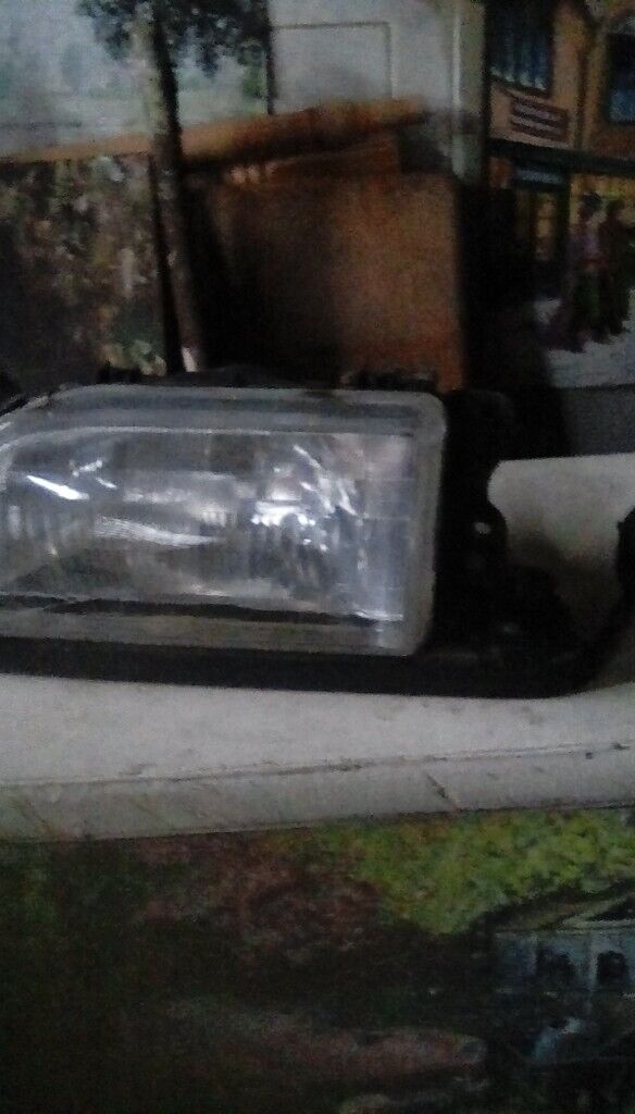 Mazda 323 headlight unit