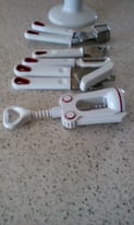 image for Kitchen utensils carousel. White with red trim. Nice quality