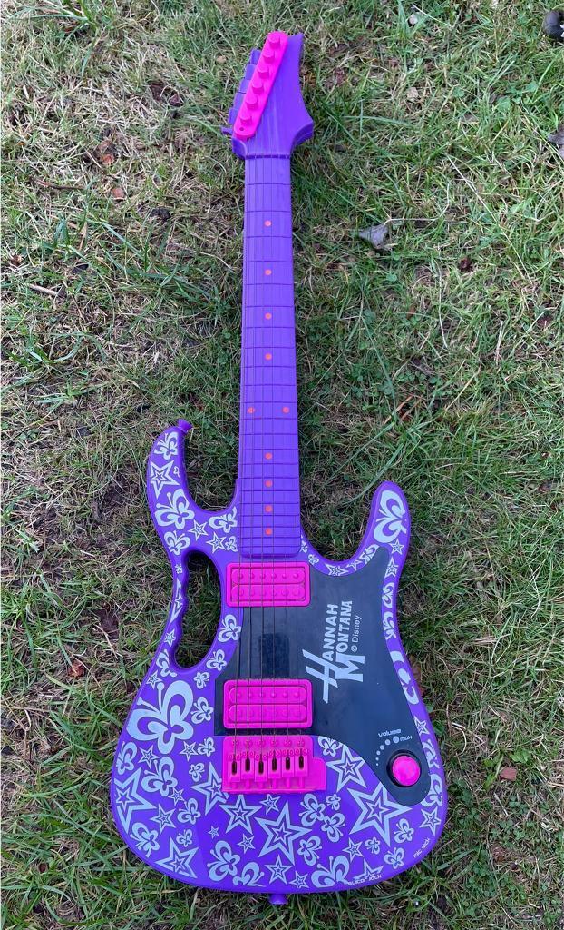 Hannah Montana (miley Cyrus)child's guitar with metal strings