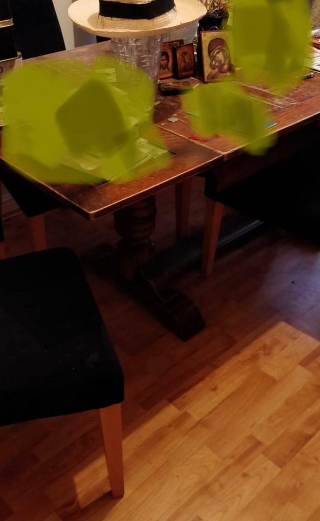 AntiqueDiningTable with extensions leaves 