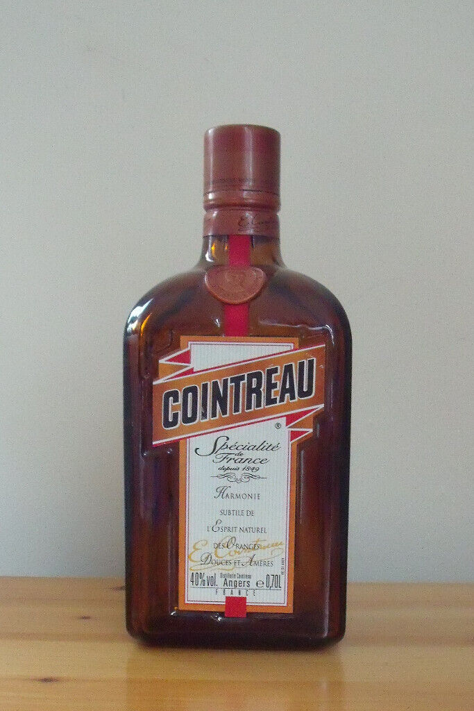 4 empty spirit bottles: Hydromel, Carlos I,Cointreau,Benedictine.Grand Marnier SOLD! £1.50 ea