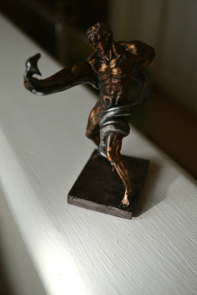 Naked athlete wrestling Python figurine
