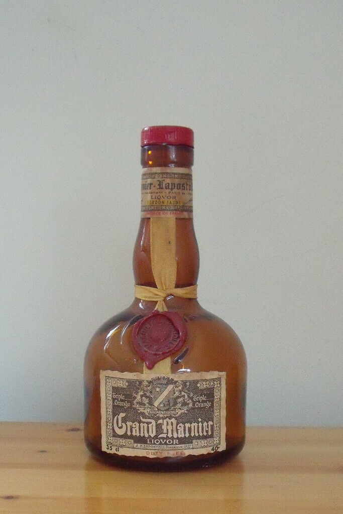4 empty spirit bottles: Hydromel, Carlos I,Cointreau,Benedictine.Grand Marnier SOLD! £1.50 ea