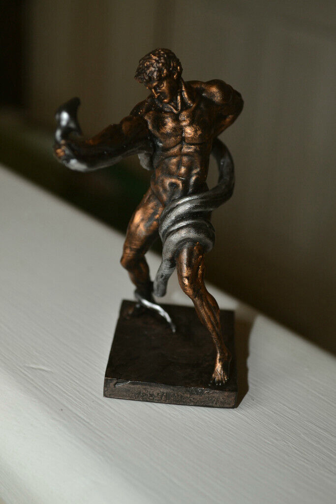 Naked athlete wrestling Python figurine