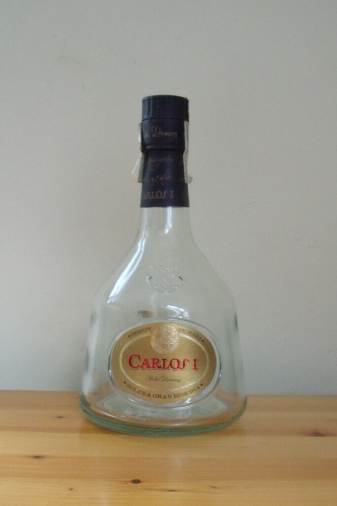 4 empty spirit bottles: Hydromel, Carlos I,Cointreau,Benedictine.Grand Marnier SOLD! £1.50 ea