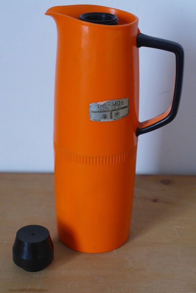 Kitchenalia: Vintage 1950s/1960s Jug-shaped Thermos Flask in Orange and black.