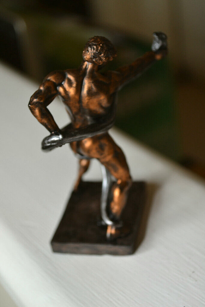 Naked athlete wrestling Python figurine