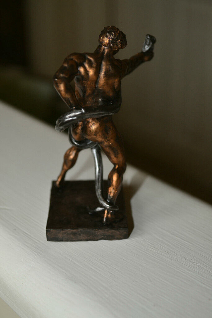 Naked athlete wrestling Python figurine