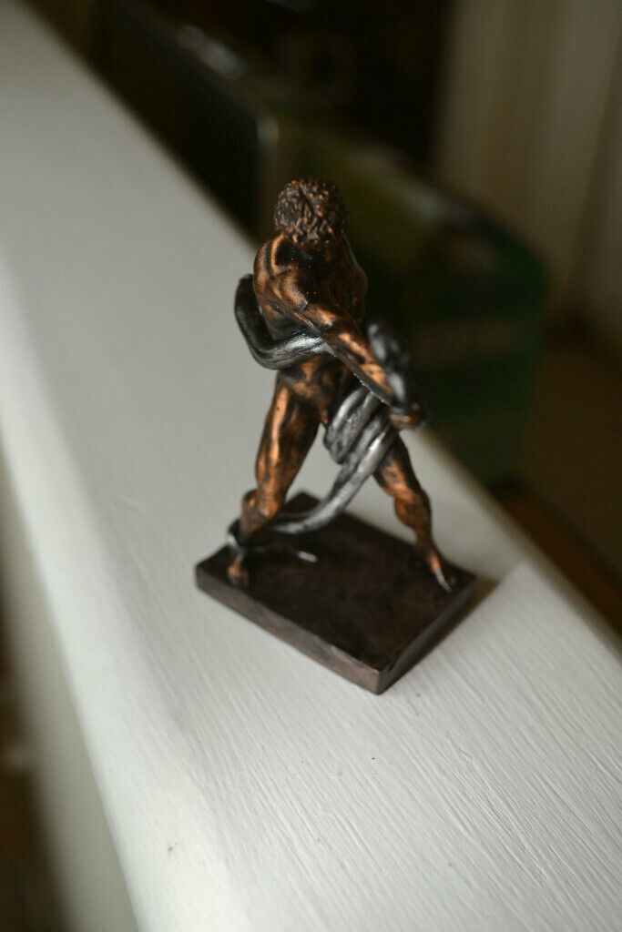 Naked athlete wrestling Python figurine