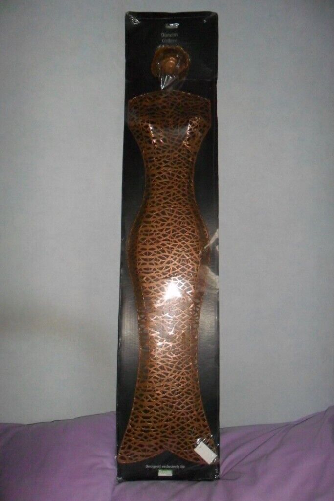 A great copper looking MANNEQUIN METAL WALL ART