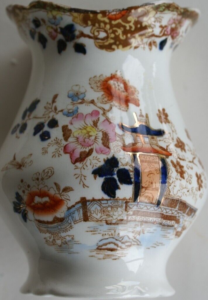 Vase with an Oriental Design featuring a lakeside pagoda and flowers