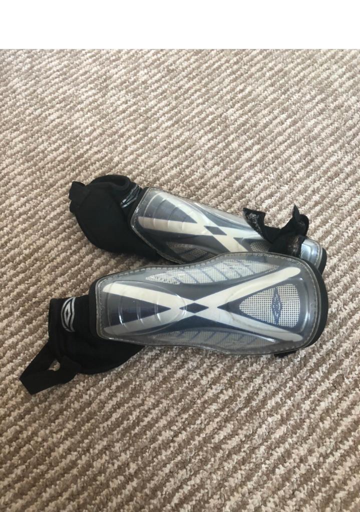 Boys black and white shin pads/guards