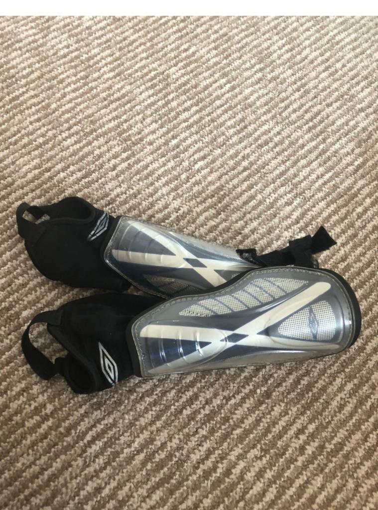 Boys black and white shin pads/guards