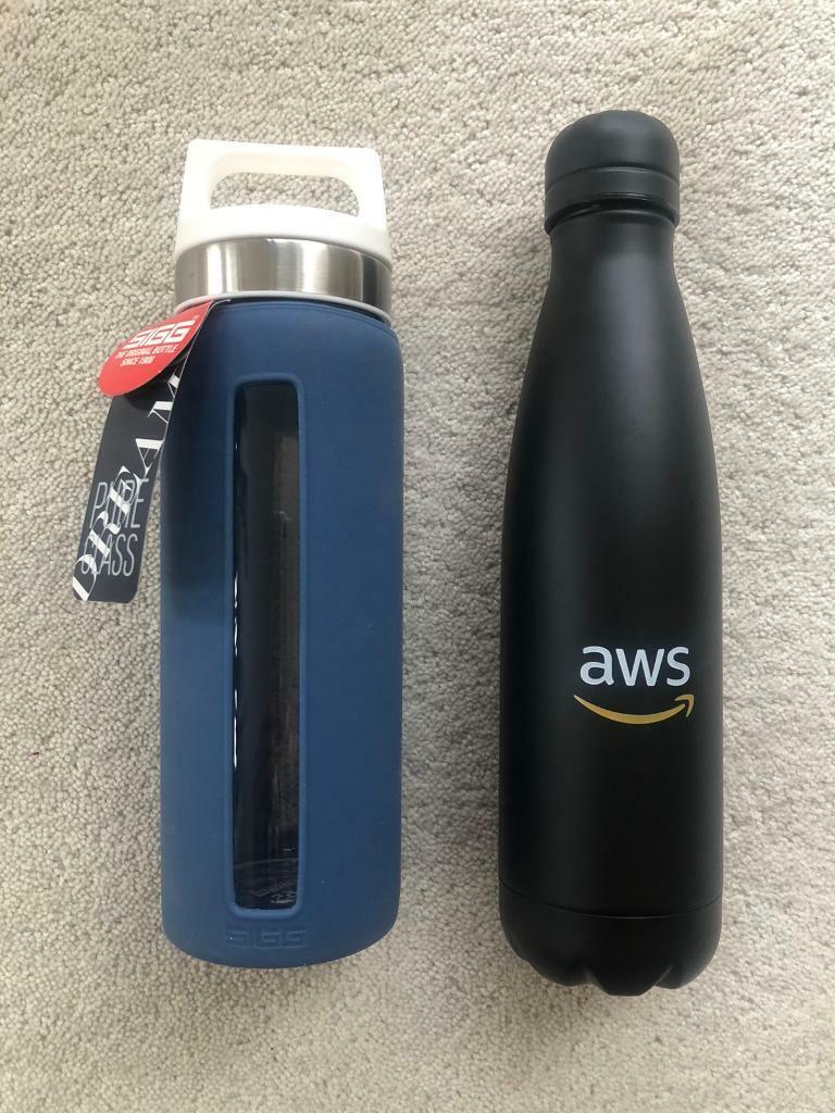 image for SIGG blue and glass heat resistant bottle and Black Metal Water Bottle. New