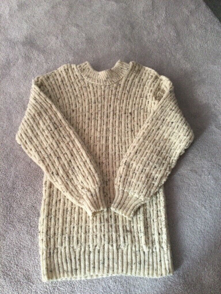 Hand knitted ladies jumpers.