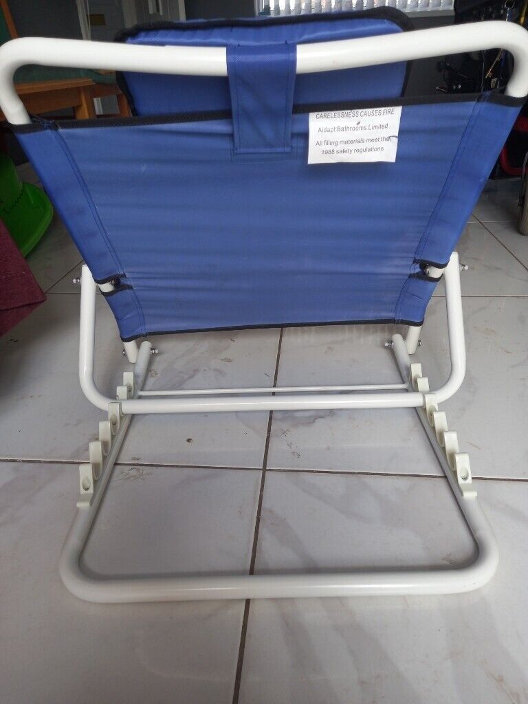 Adjustable back rest with multiple uses