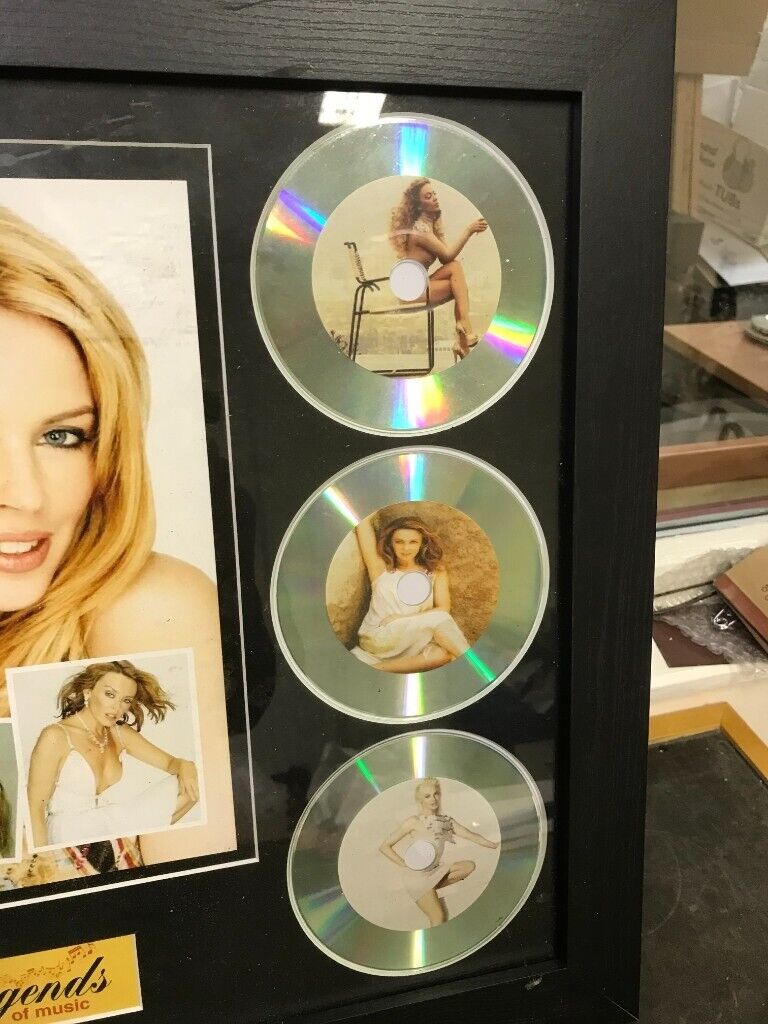 KYLIE MINOGUE LEGENDS OF MUSIC CD AND PRINT IN BLACK FRAME
