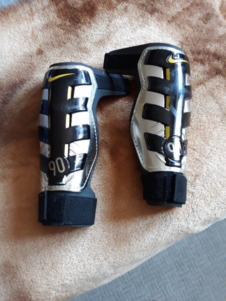  football black, silver and gold knee pads 