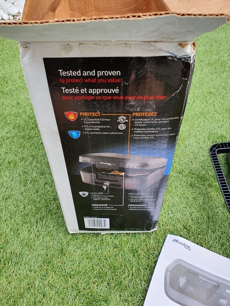  Master lock fire and flood security Chest  No keys with it as a small crack on the bottom see pics