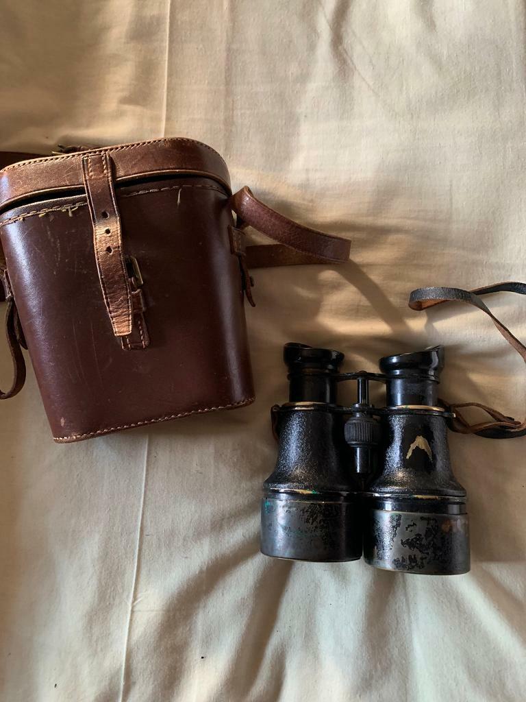 Binoculars and original leather case. £30
