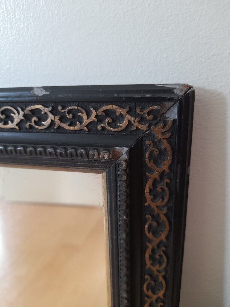 Mirror with decorative frame