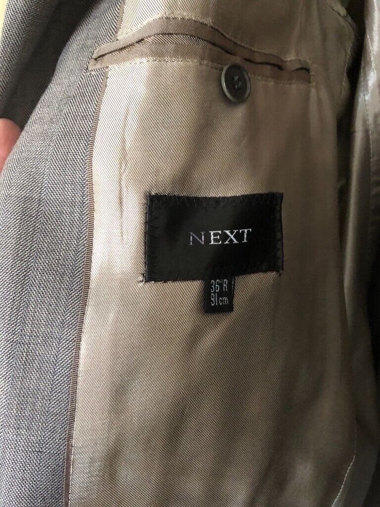 NEXT SUITS